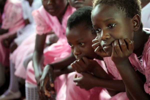 Pink_communion_girls_sitting__medium