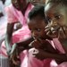 Pink_communion_girls_sitting__thumb