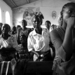 Girl_in_red_with_crowd_b_w_thumb